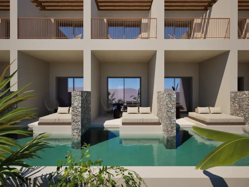 Moderne Gebäudefassade mit mehreren Pools und abgegrenzten Terrassenbereichen.