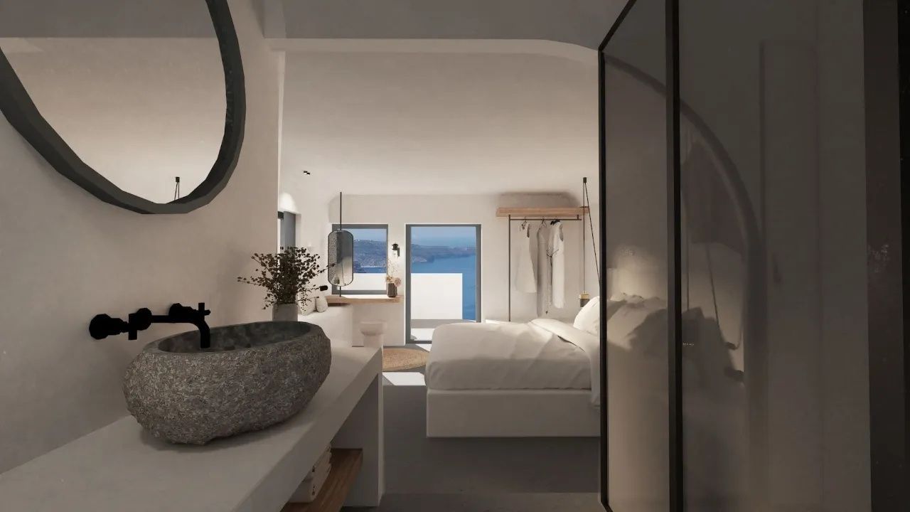 Helles Hotelzimmer mit Doppelbett, Waschtisch aus Stein und Blick auf das Meer.