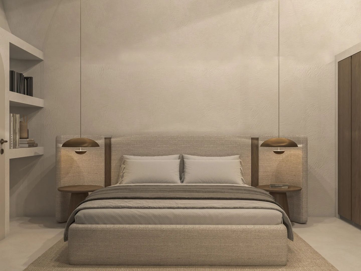 Doppelbett mit Stoffkopfteil und zwei hängenden Nachttischlampen an einer hellen Wand.