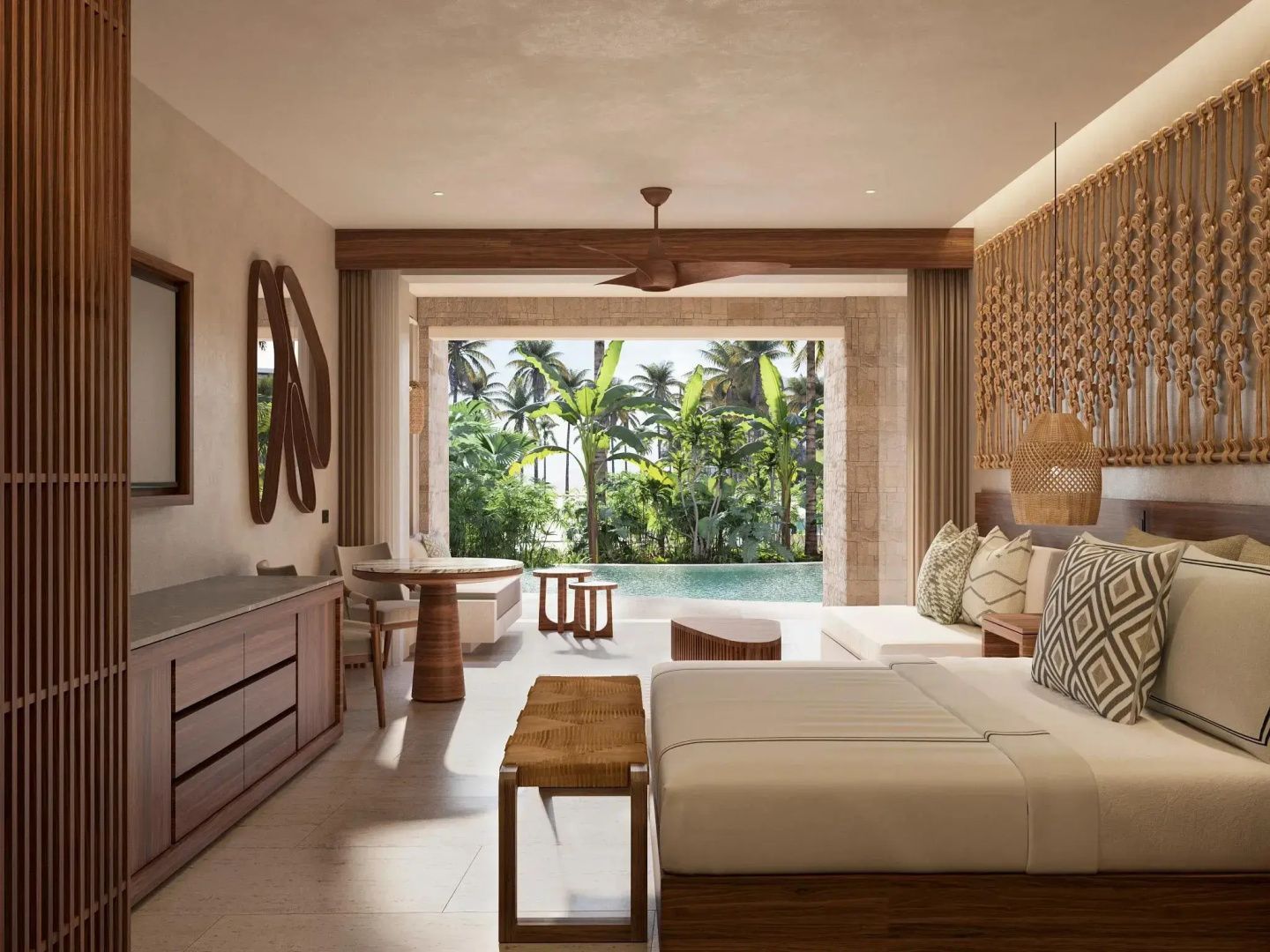 Helles Hotelzimmer mit Doppelbett, Sitzbereich und Zugang zur Terrasse mit Swim-up-Pool.