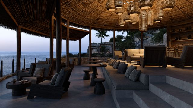 Runde Bar mit Rattanleuchten und Lounge-Sitzplätzen über dem Meer im OKU Bodrum