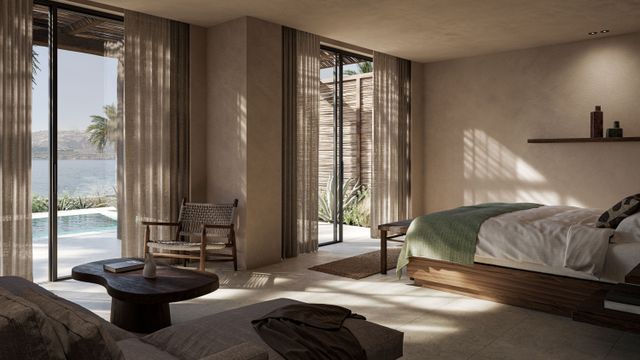 Helle Suite im OKU Bodrum mit Doppelbett, Sitzecke und Zugang zum Pool